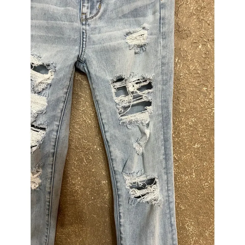 American Eagle Highest Rise Jegging Next Level Stretch Distress Raw Hem Size 00